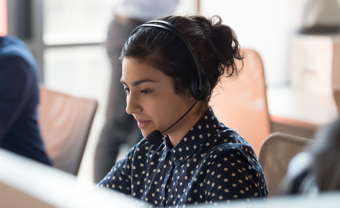 Is Outsourcing the same as Managed IT services?A woman works in a call centre